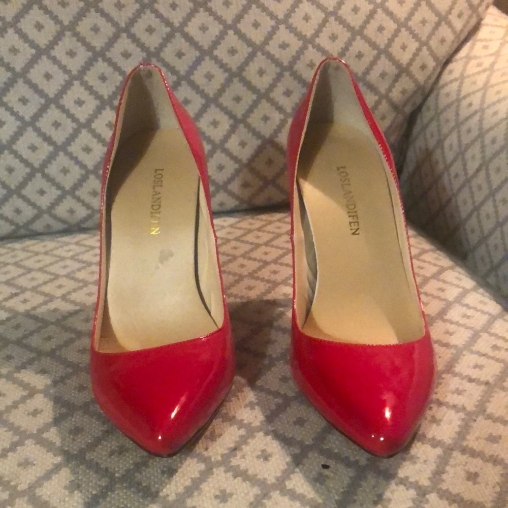 Red patent leather pumps
